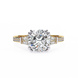 Diamond ring with gold band on a white background