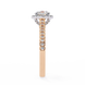 Two-tone ring with diamond accents on a white background