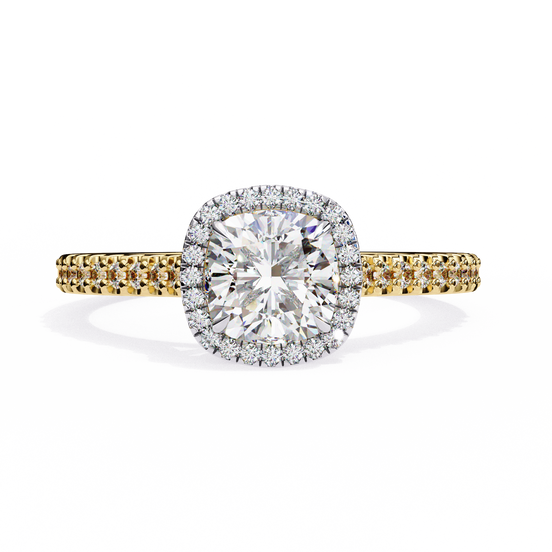 Diamond ring with yellow and white gold band on a white background