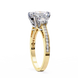 Gold ring with a diamond on a white background