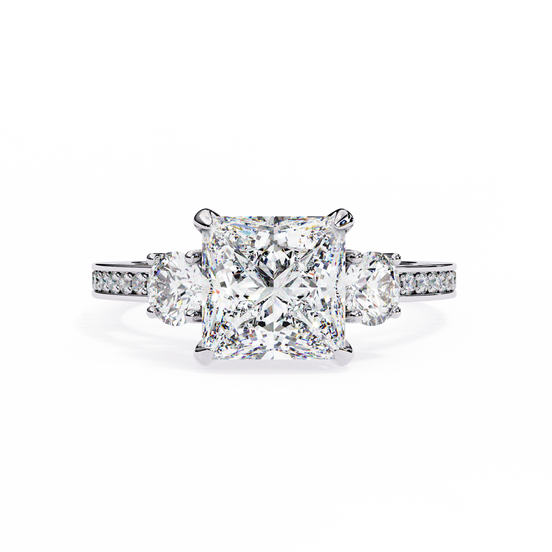Diamond ring with a central princess-cut diamond and smaller round diamonds on a white background