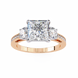 Rose gold ring with a large central diamond and smaller diamonds on the sides against a white background