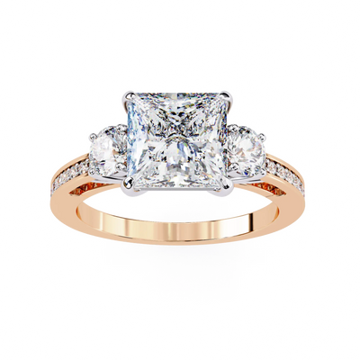 Rose gold ring with a large central diamond and smaller diamonds on the sides against a white background