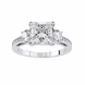 Diamond ring with a central princess-cut diamond and two smaller diamonds on a white background