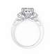 Diamond ring with a central diamond and smaller diamonds on a white background