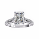 Diamond ring with intricate design on a white background