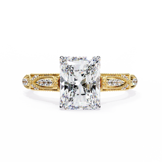 Gold ring with a large diamond on a white background
