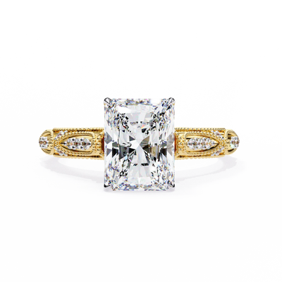 Gold ring with a large diamond on a white background
