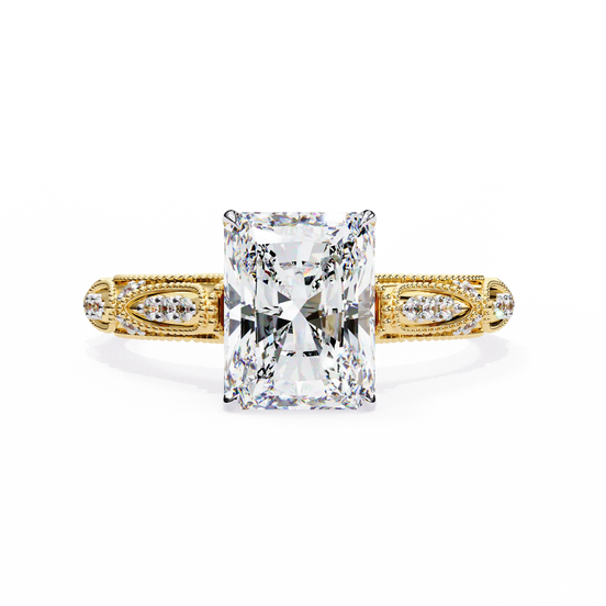 Gold ring with a large diamond on a white background