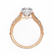 Rose gold ring with a heart-shaped diamond on a white background