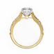 Gold ring with a heart-shaped diamond on a white background
