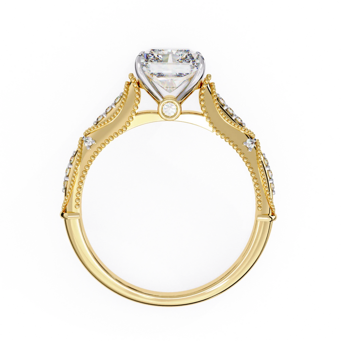 Gold ring with a heart-shaped diamond on a white background