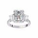 Diamond ring with a large emerald-cut center stone on a white background