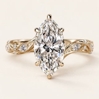 Marquise cut lab grown diamond engagement ring with 2.00 ct center, protective pointed-end prongs, leaf-like openwork shoulders and marquise and round diamond accents in yellow gold.