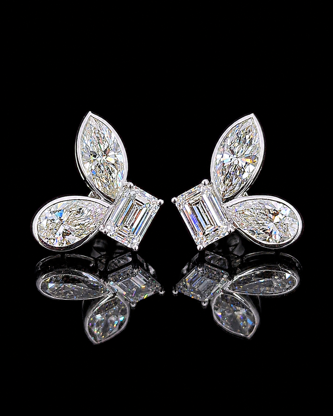 White gold mixed-cut stud earrings with marquise, emerald and pear lab grown diamonds on black