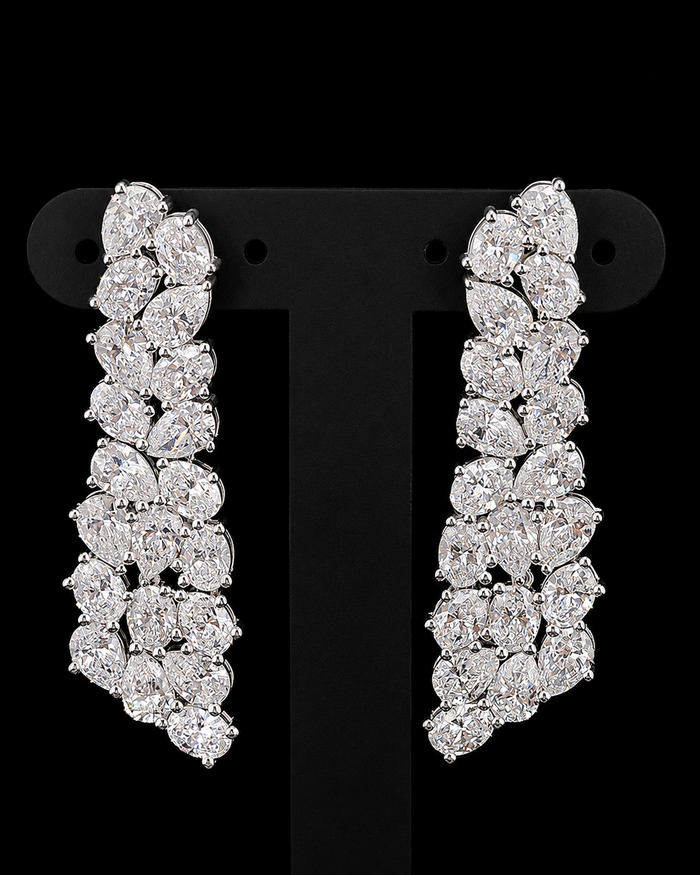 White gold cluster drop earrings with pear and oval lab grown diamonds on black