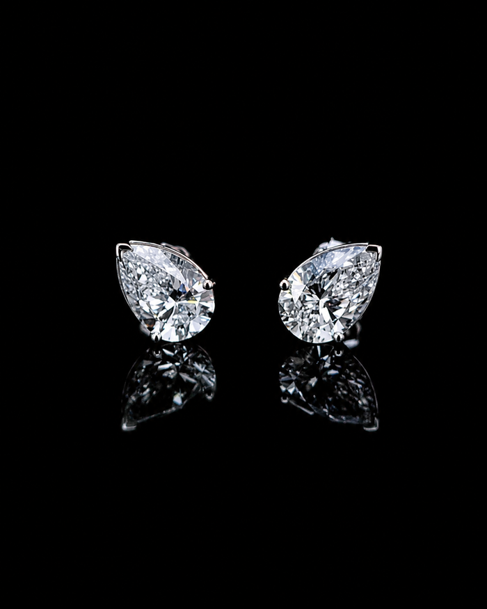 white gold pear solitaire stud earrings with lab grown diamonds