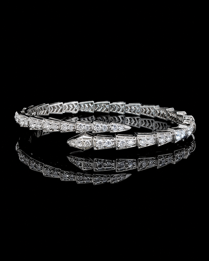 White gold wrap bracelet with graduated round lab grown diamonds shown in rotating view