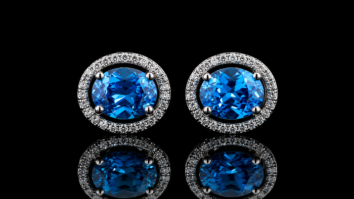 white gold halo earrings with blue oval lab grown diamond centres