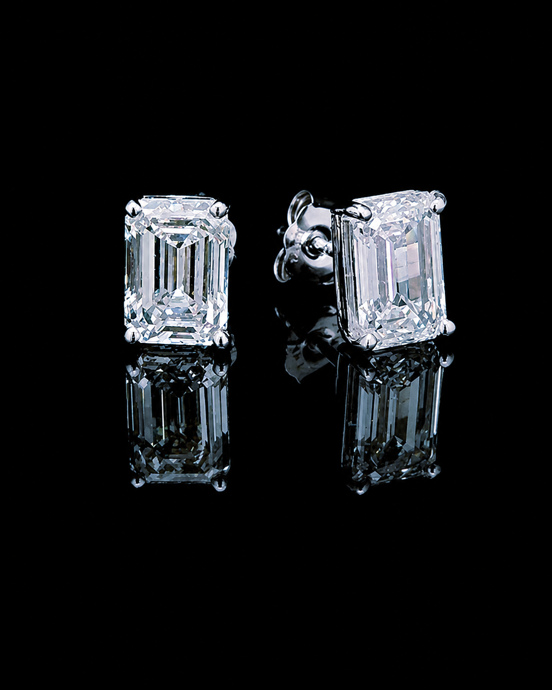 White gold emerald-cut solitaire stud earrings with 2.02ct total lab grown diamonds on black