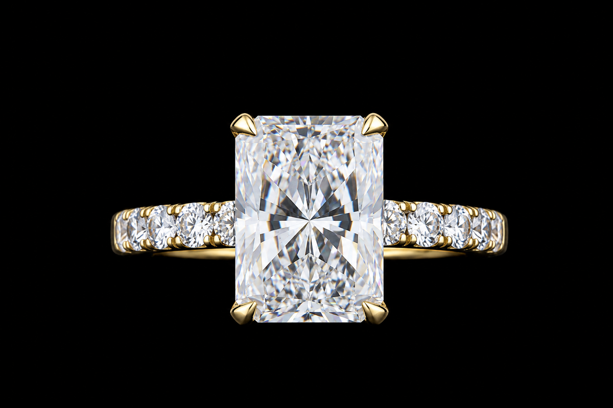 Yellow gold ring with 5.25ct radiant lab grown diamond and pavé diamond band on black