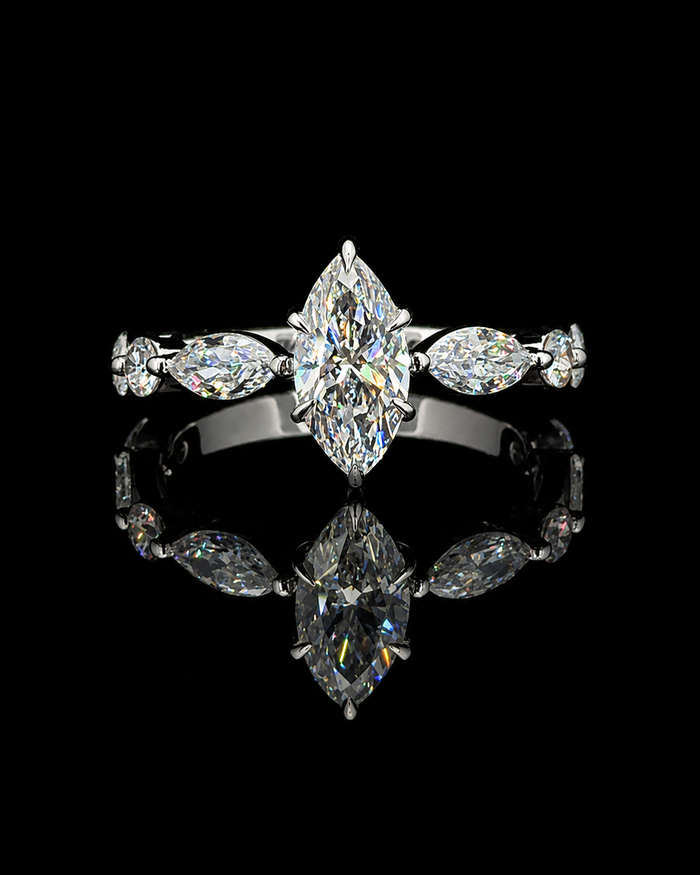 White gold 0.88ct marquise nine-stone ring with 8 lab grown diamond side stones on black
