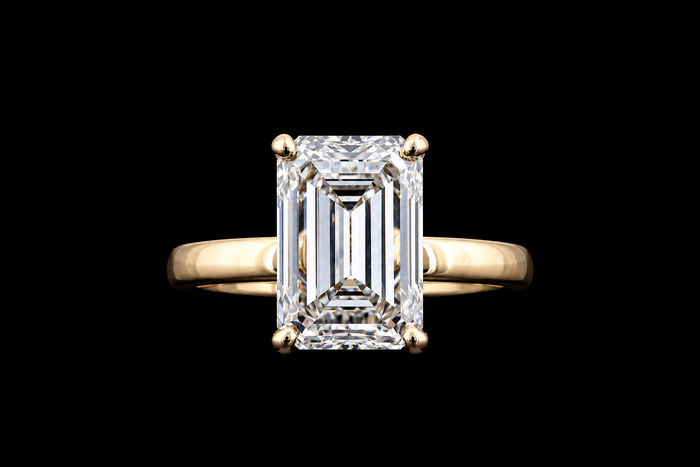 Yellow gold ring with 2.50ct radiant cut lab grown diamond solitaire photographed on black
