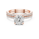 Round brilliant diamond ring with double pavé diamond band and four-prong solitaire setting