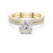 Round brilliant diamond ring with double pavé diamond band and four-prong solitaire setting
