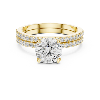 Front-facing view of a yellow gold round diamond double pavé ring.