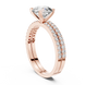 Round brilliant diamond ring with double pavé diamond band and four-prong solitaire setting