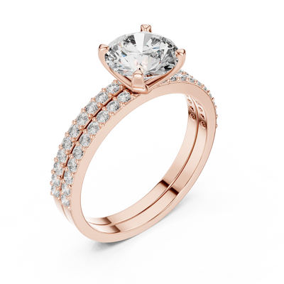Side profile view of a rose gold round diamond double pavé ring.