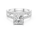 Princess cut diamond ring with double pavé diamond band and four-prong setting