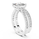 Princess cut diamond ring with double pavé diamond band and four-prong setting