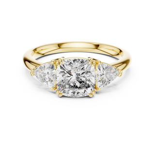 Cushion lab grown diamond three stone engagement ring in yellow gold