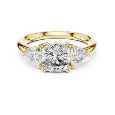 Cushion lab grown diamond three stone engagement ring in yellow gold