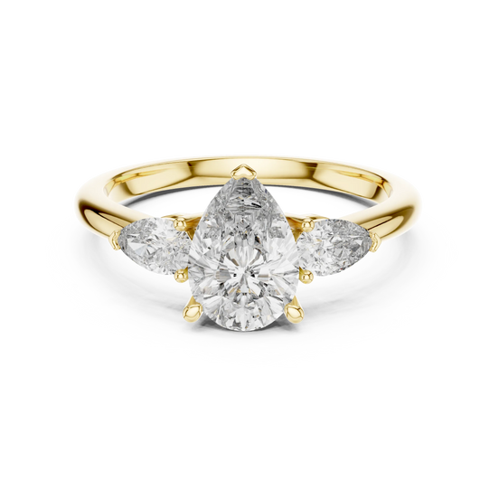 Pear lab grown diamond three stone engagement ring in yellow gold
