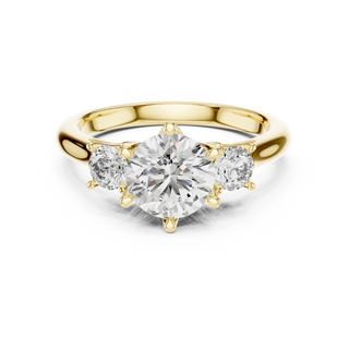 Round lab grown diamond three stone engagement ring in yellow gold