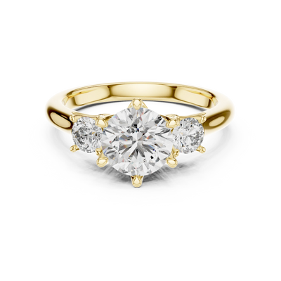 Round lab grown diamond three stone engagement ring in yellow gold