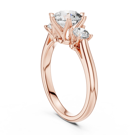 Round lab grown diamond three stone engagement ring in rose gold