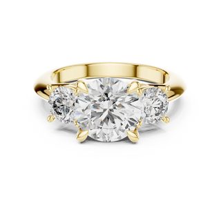 Round lab grown diamond three stone engagement ring in yellow gold