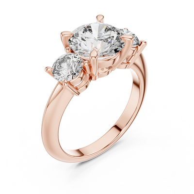 Round lab grown diamond three stone engagement ring in rose gold