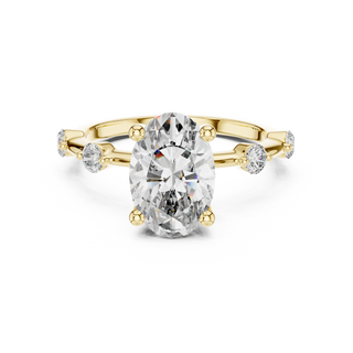 oval lab grown diamond split shank engagement ring in yellow gold