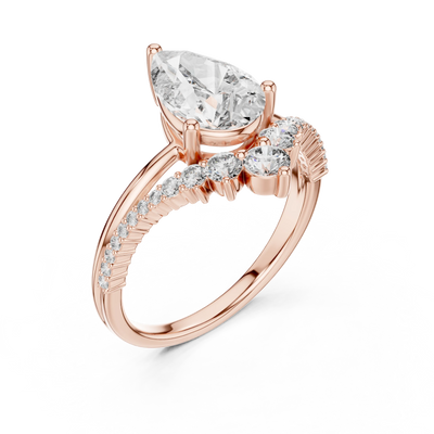pear diamond split-shank engagement ring in rose gold
