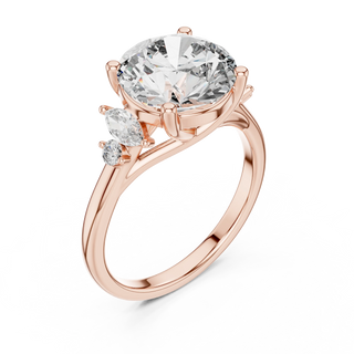 round diamond marquise side-stone ring in rose gold
