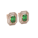 Emerald cut green gemstone double halo stud earrings with octagonal diamond halo in gold