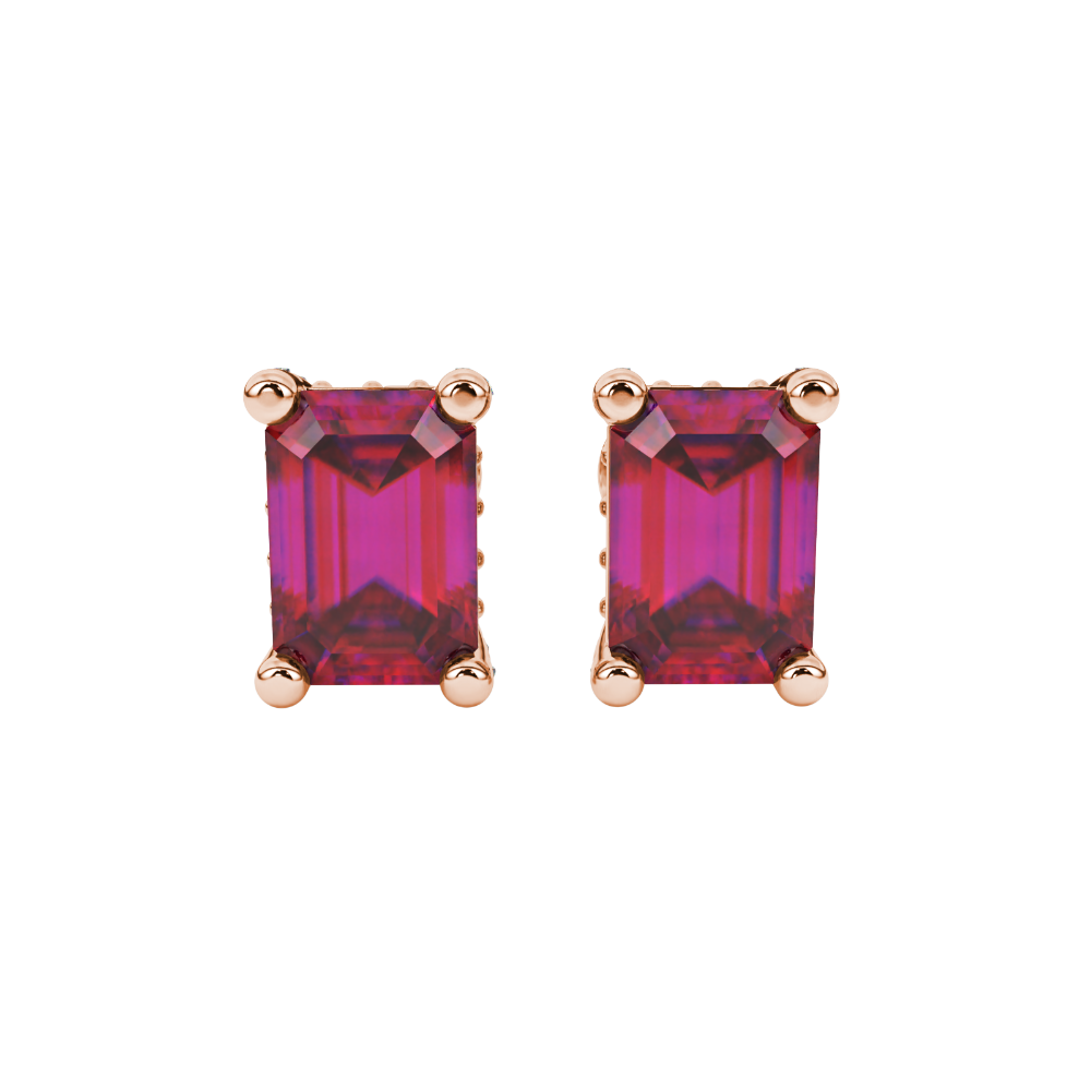 Red emerald cut gemstone stud earrings in rose gold four-prong setting