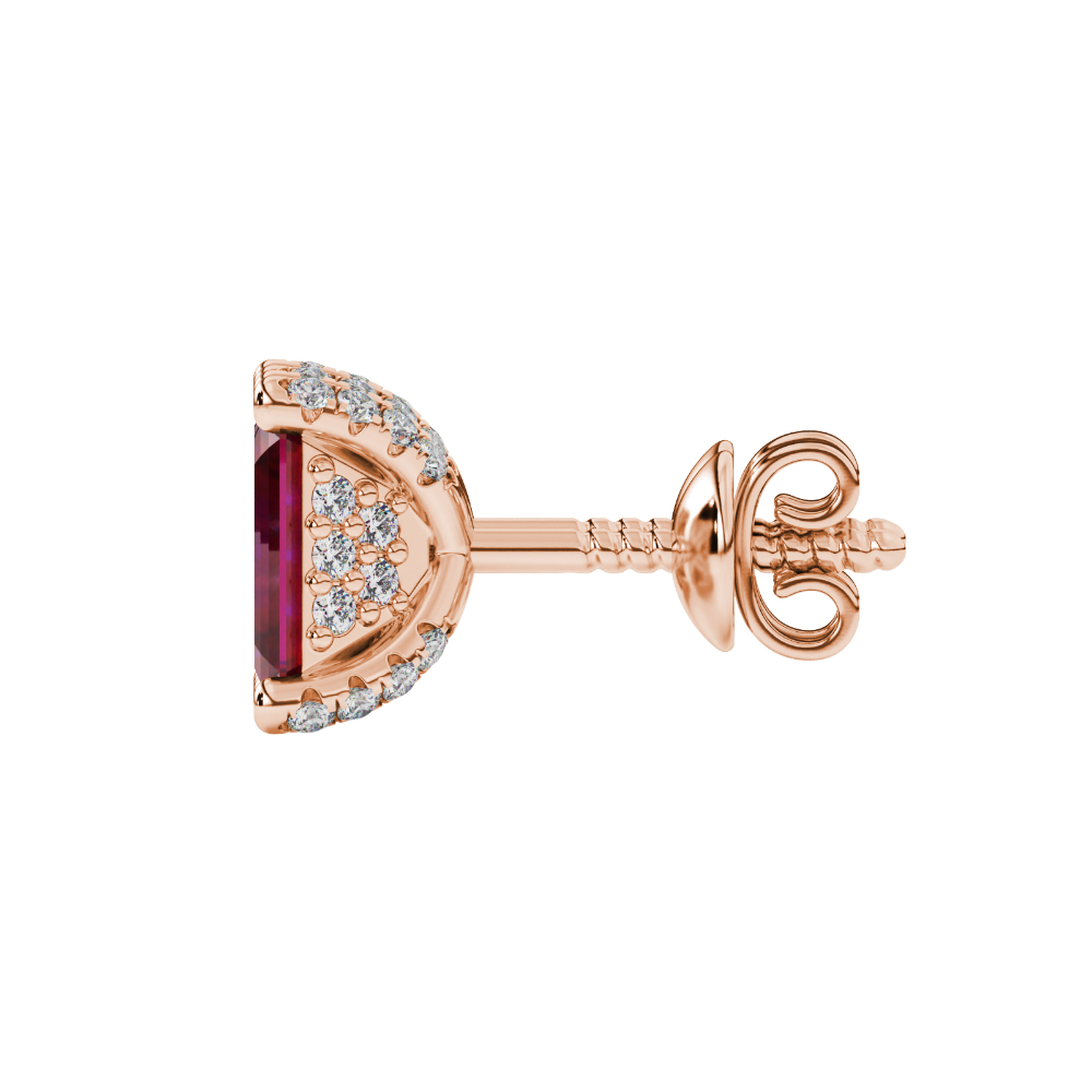 Red emerald cut gemstone stud earrings in rose gold four-prong setting