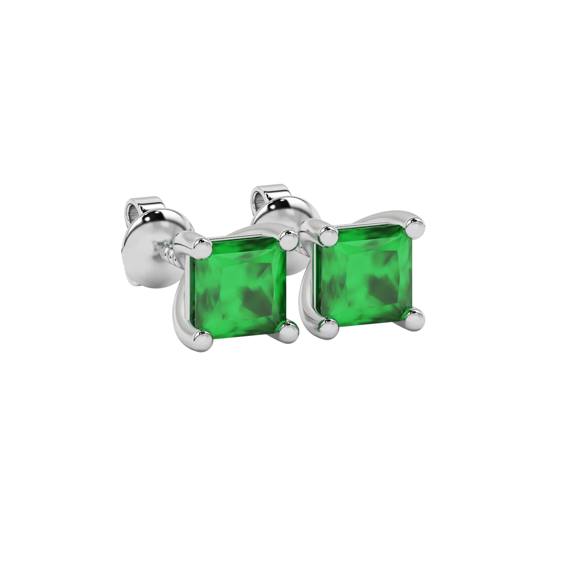 Close-up emerald green gemstone earing, white gold basket setting.
