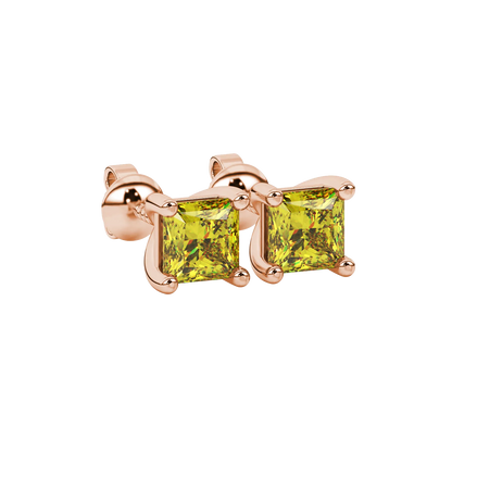 Close-up, princess canary yellow gemstone earrings, rose gold basket setting.